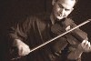 Photo of Brendan Taaffe with a fiddle - Photo copyright Maurice Gunning